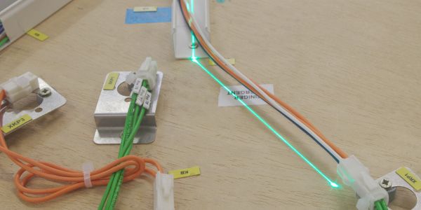 Laser-guided wire harness production